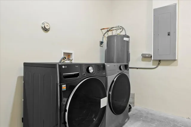 a view of a house with a yard and garage