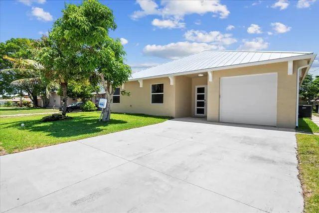 a view of an outdoor dining space with furniture