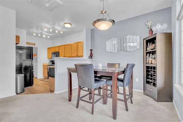 a view of a dining room with furniture
