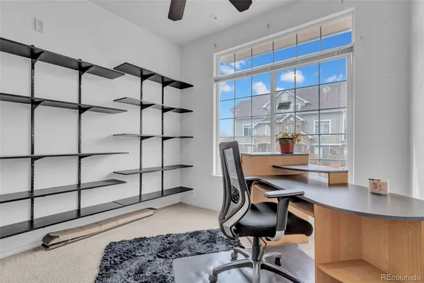 a view of a workspace with furniture