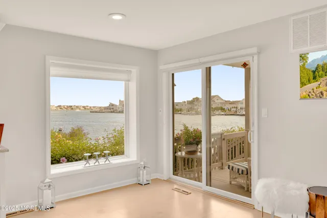 a view of a room with a large window