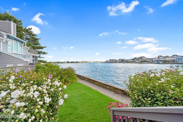 a view of a lake from a balcony