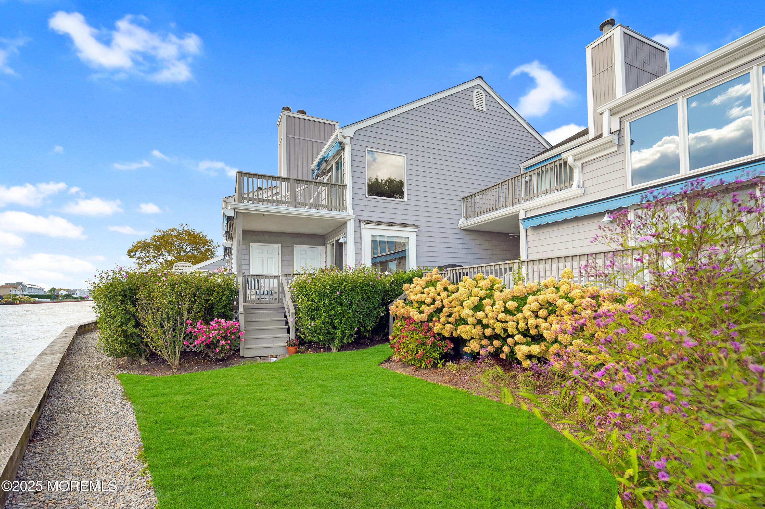 4 Bay Point Harbour Point Pleasant, NJ 08742 - Photo 28 of 46 a front view of a house with a yard
