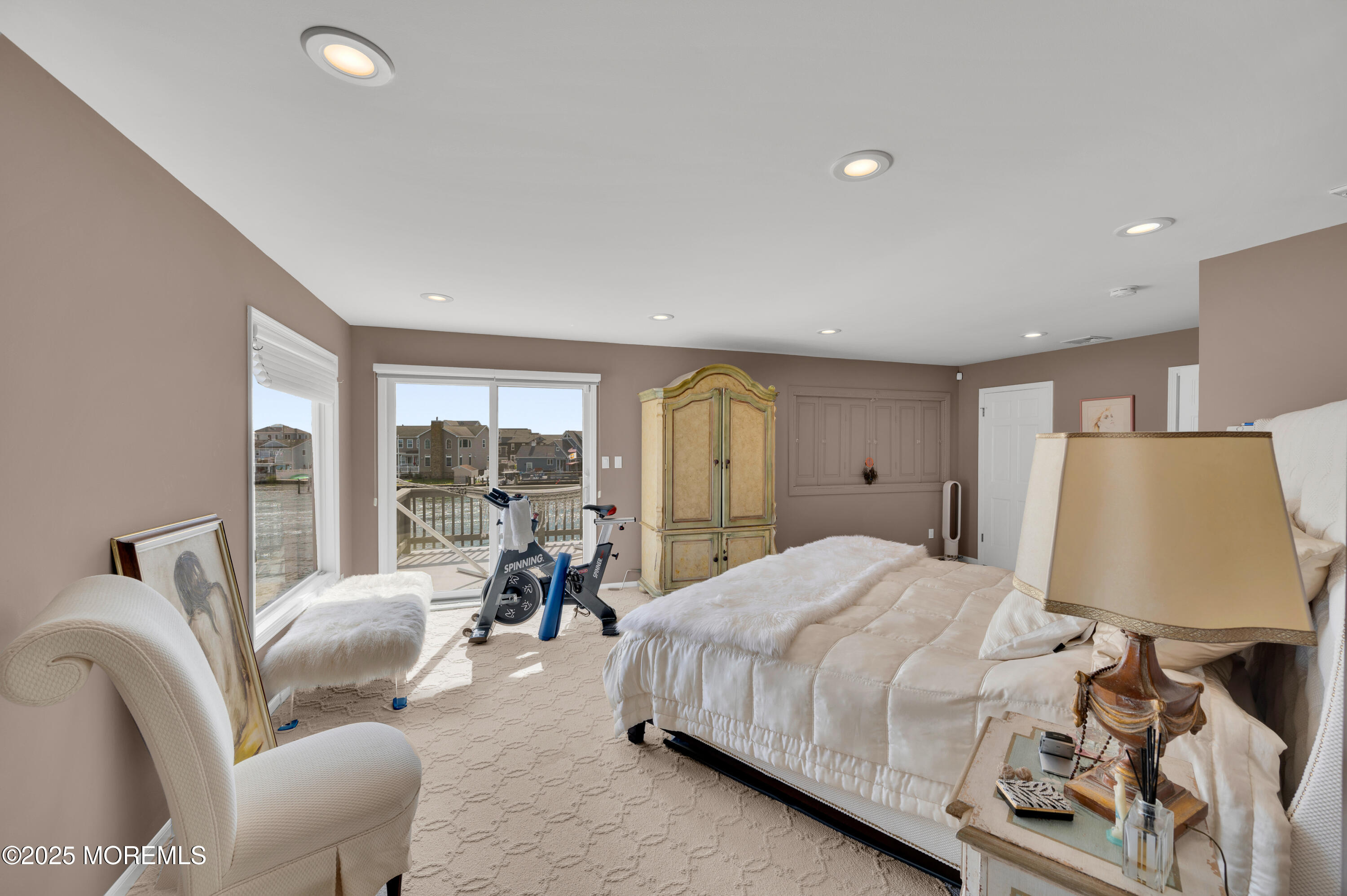 4 Bay Point Harbour Point Pleasant, NJ 08742 - Photo 30 of 46 a bedroom with a bed and a chair