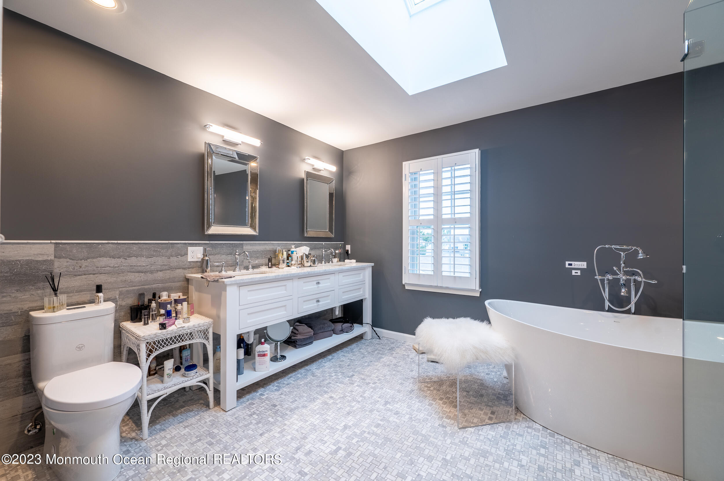 4 Bay Point Harbour Point Pleasant, NJ 08742 - Photo 34 of 46 a bathroom with a sink a toilet and mirror