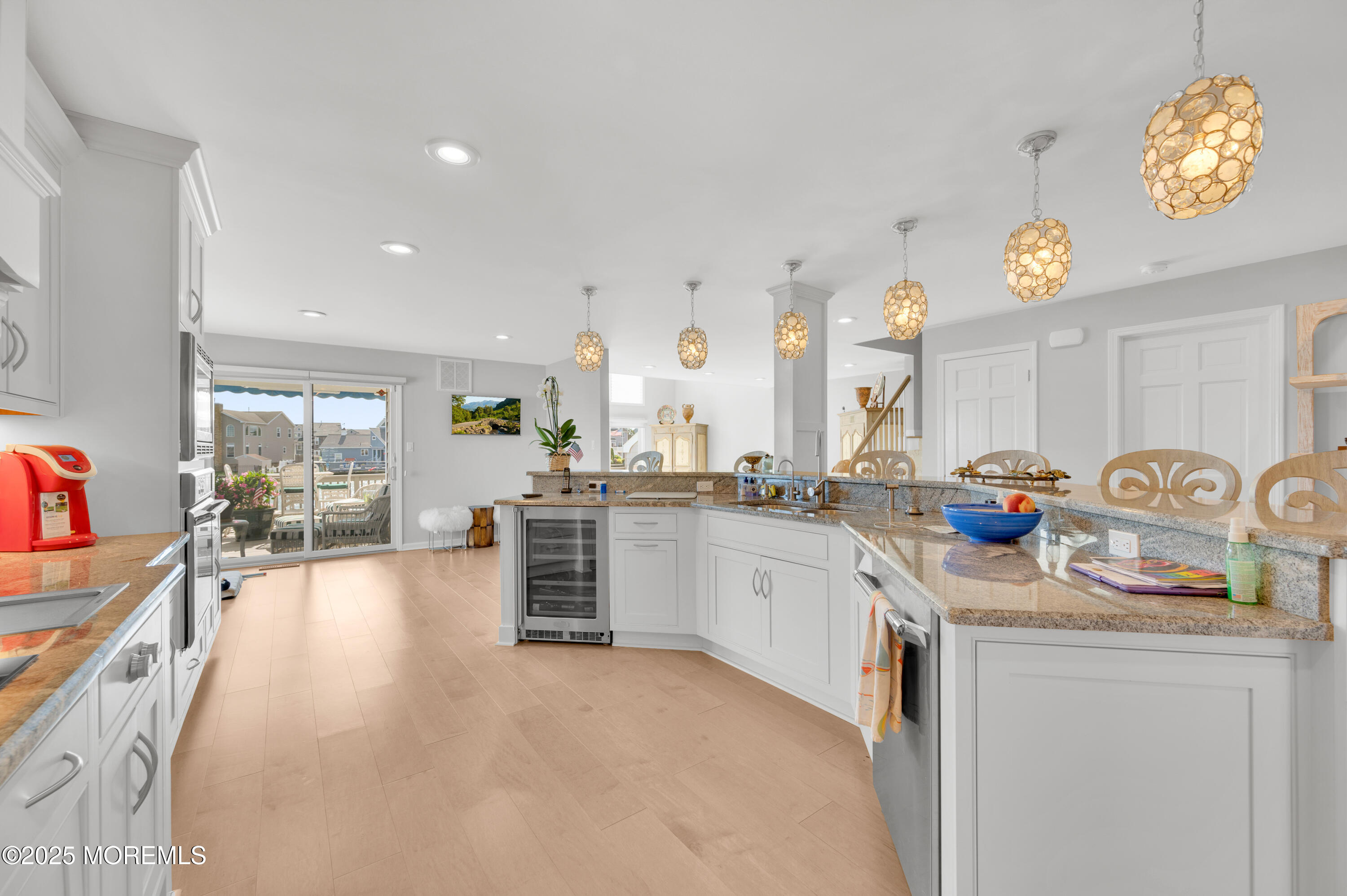 4 Bay Point Harbour Point Pleasant, NJ 08742 - Photo 6 of 46 a kitchen with granite countertop a sink stove and cabinets