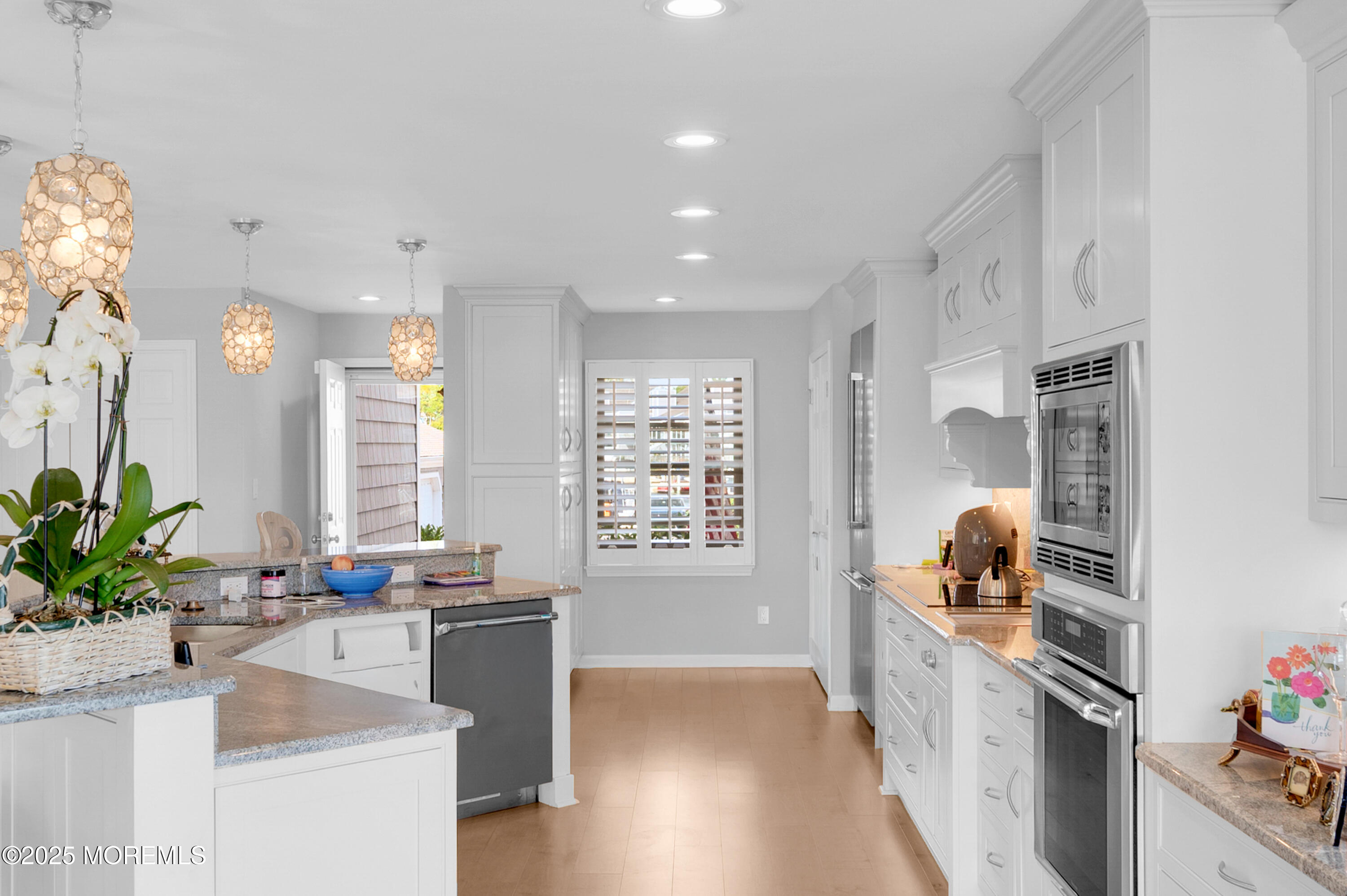 4 Bay Point Harbour Point Pleasant, NJ 08742 - Photo 7 of 46 a kitchen with granite countertop a sink stove and cabinets