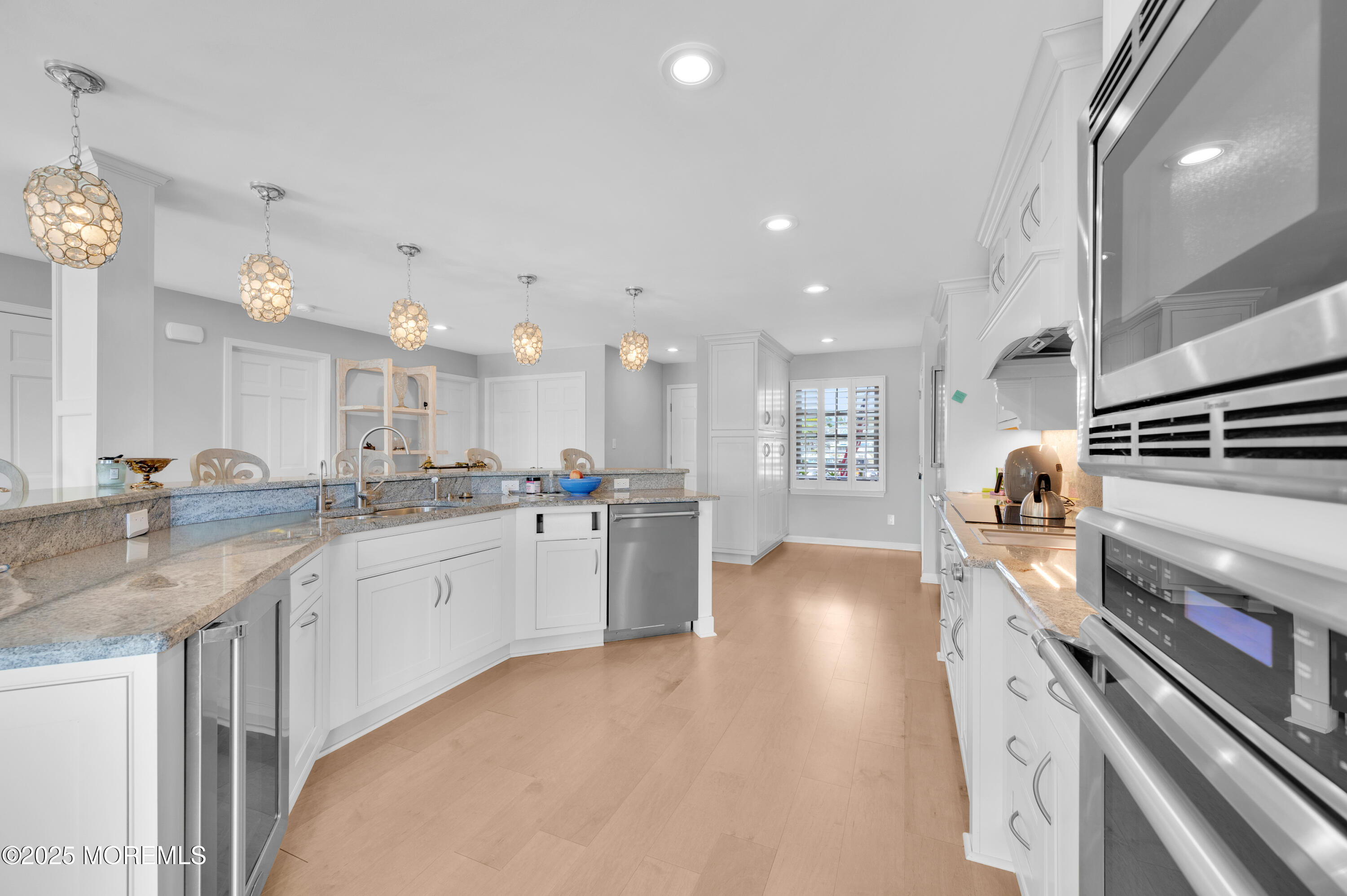 4 Bay Point Harbour Point Pleasant, NJ 08742 - Photo 8 of 46 a kitchen with stainless steel appliances granite countertop a sink and stove top oven