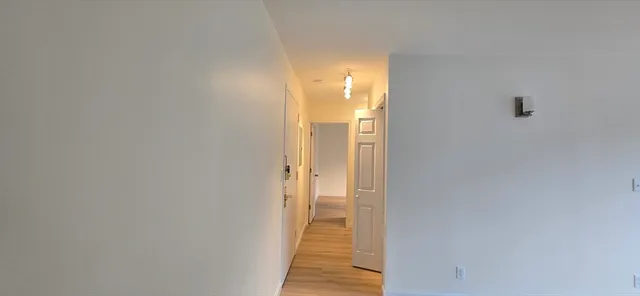 a view of a bathroom with bathroom and shower