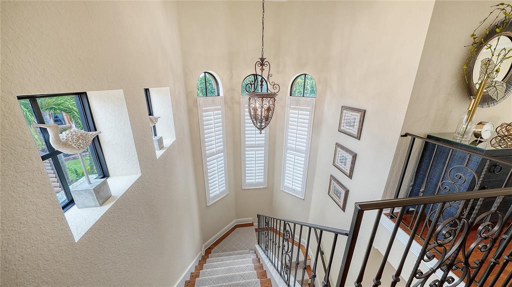 1630 Assisi Drive, Unit 18 Sarasota, FL 34231 - Photo 21 of 42 a view of front door door with stairs