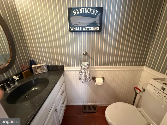 a view of a entryway with furniture and a potted plant