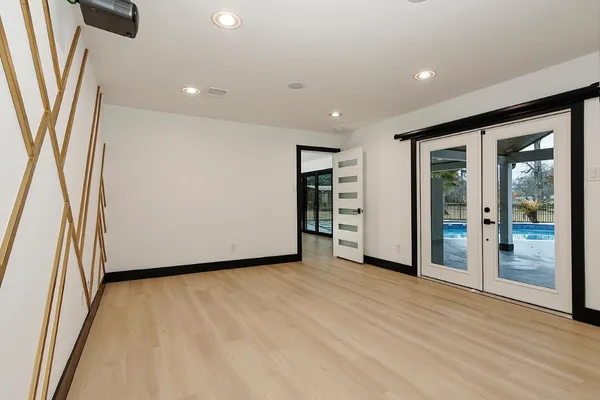 a white bath tub sitting next to a white sink