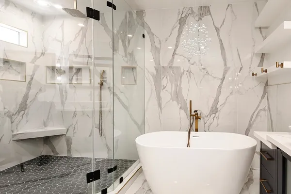 a bathroom with a double vanity and a mirror