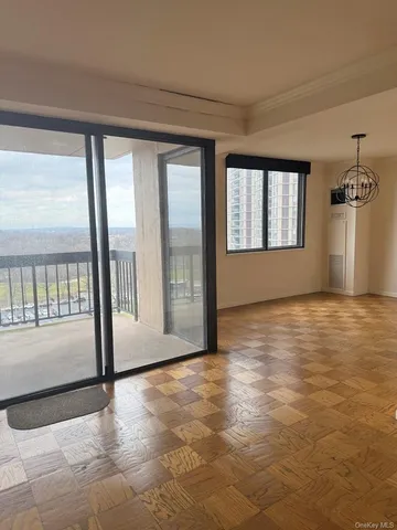 a view of an empty room and window
