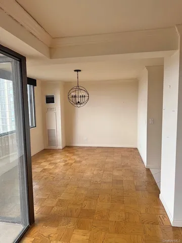 a view of an empty room and window