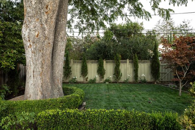 a view of a lake with a yard