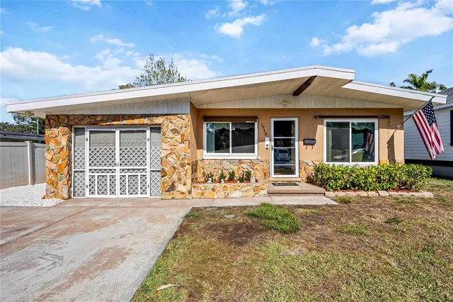 front view of a house with a patio