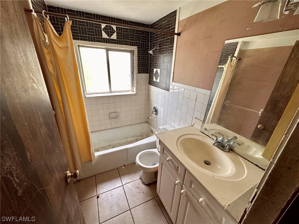 2012 Wright Street Fort Myers, FL 33916 - Photo 16 of 20 a bathroom with a sink toilet and shower