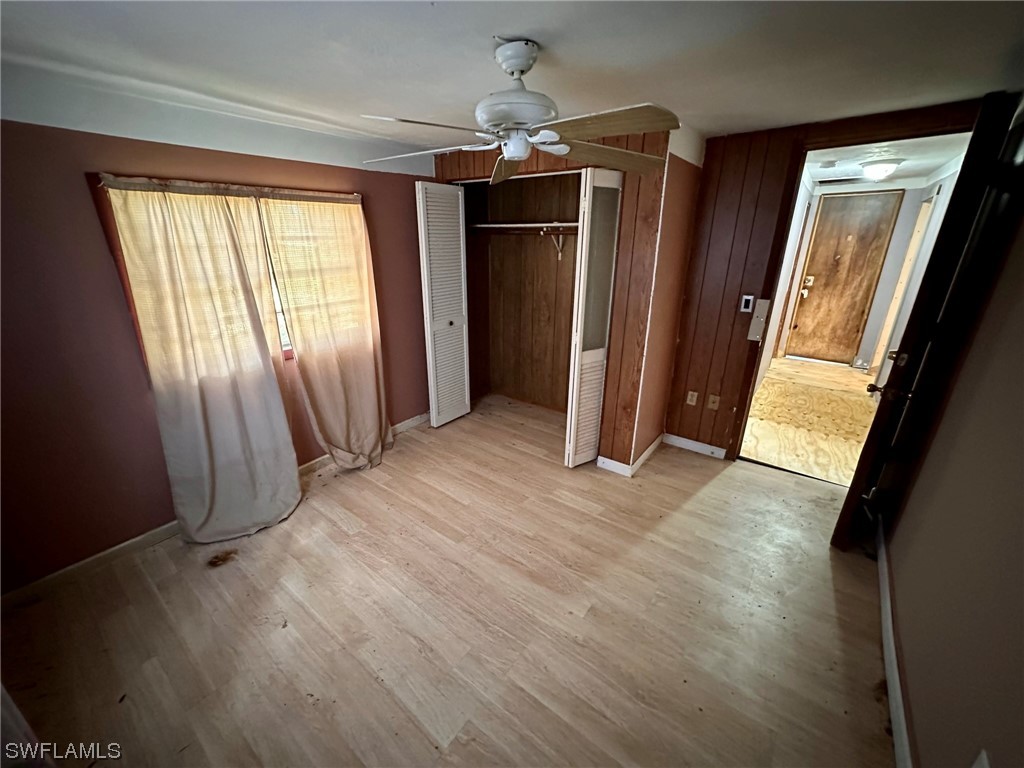 2012 Wright Street Fort Myers, FL 33916 - Photo 18 of 20 an empty room with wooden floor and windows