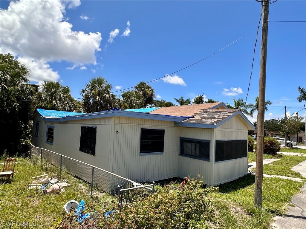 2012 Wright Street Fort Myers, FL 33916 - Photo 3 of 20 a front view of a house with a yard