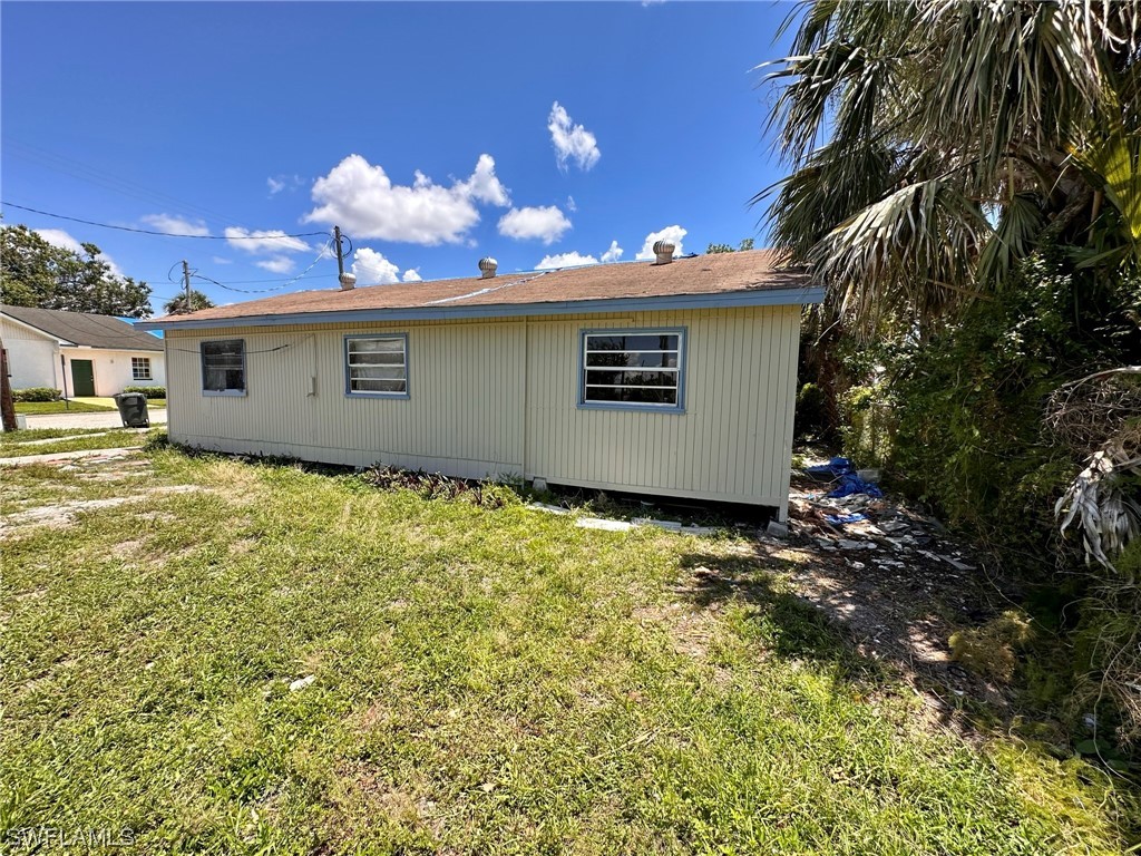 2012 Wright Street Fort Myers, FL 33916 - Photo 4 of 20 a view of a house with a yard