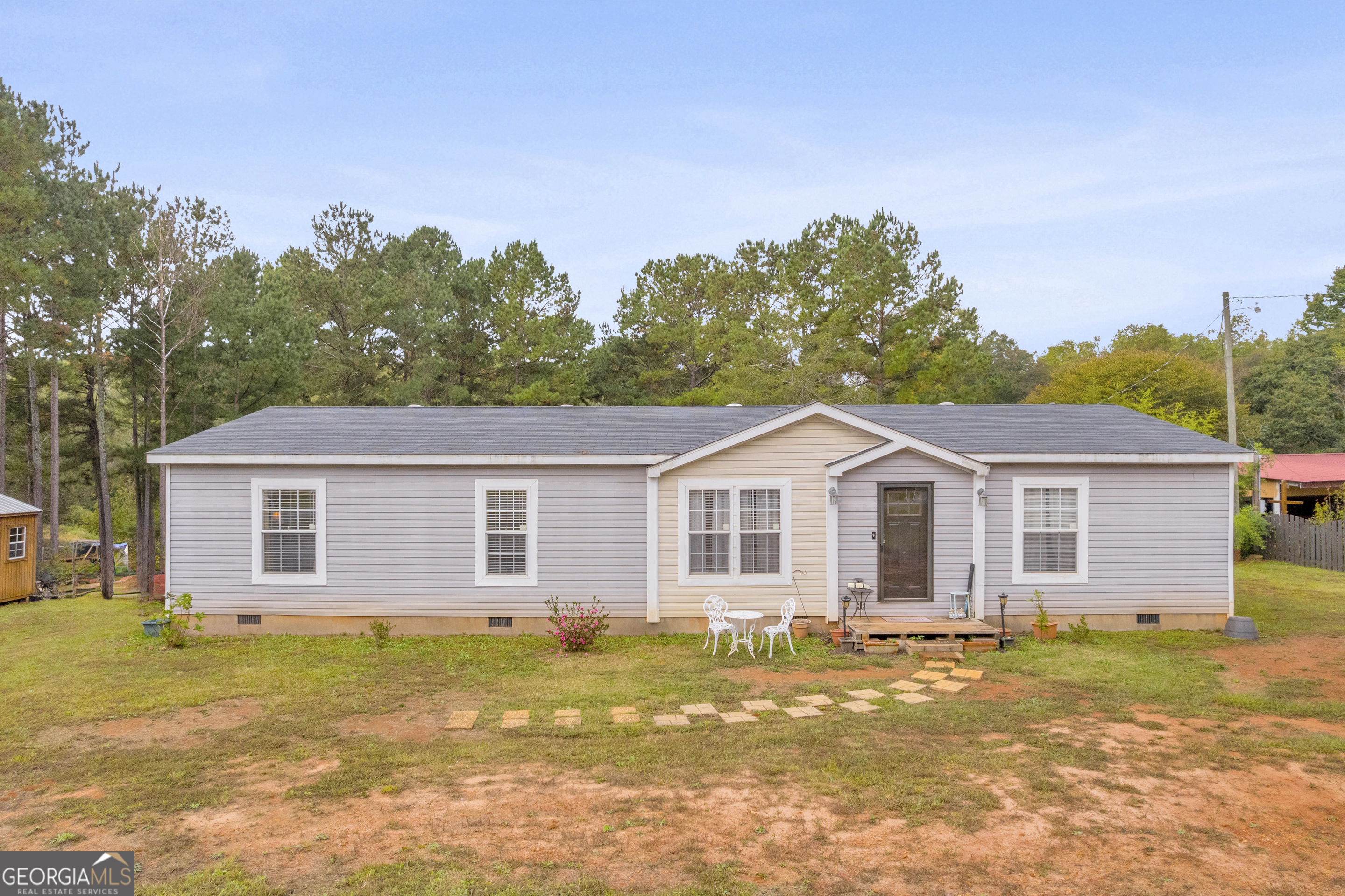 466 Trotters Ridge Jefferson, GA 30549 - Photo 1 of 1 a view of a house with a swimming pool and a yard
