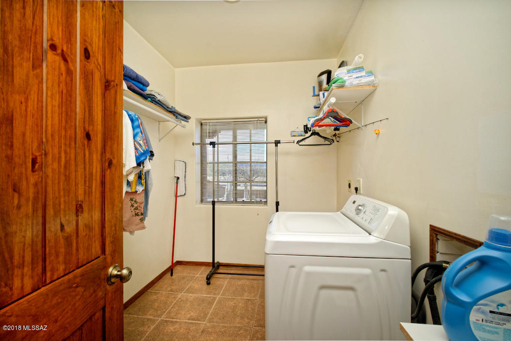 1721 Camino Jalisco Rio Rico, AZ 85648 - Photo 10 of 39 a utility room with dryer and washer