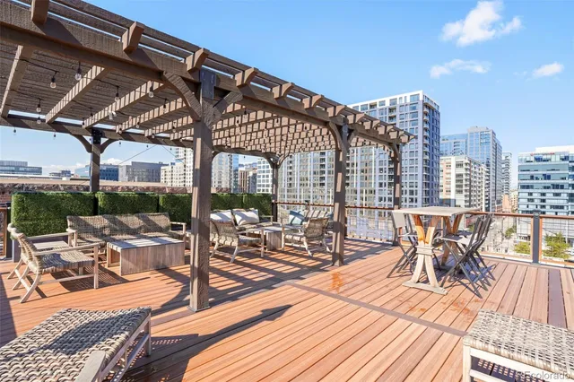 a view of a patio with table and chairs