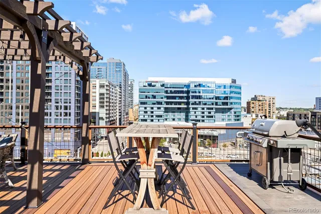 a view of a balcony with wooden floor