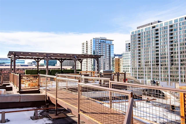 a view of a balcony with chairs