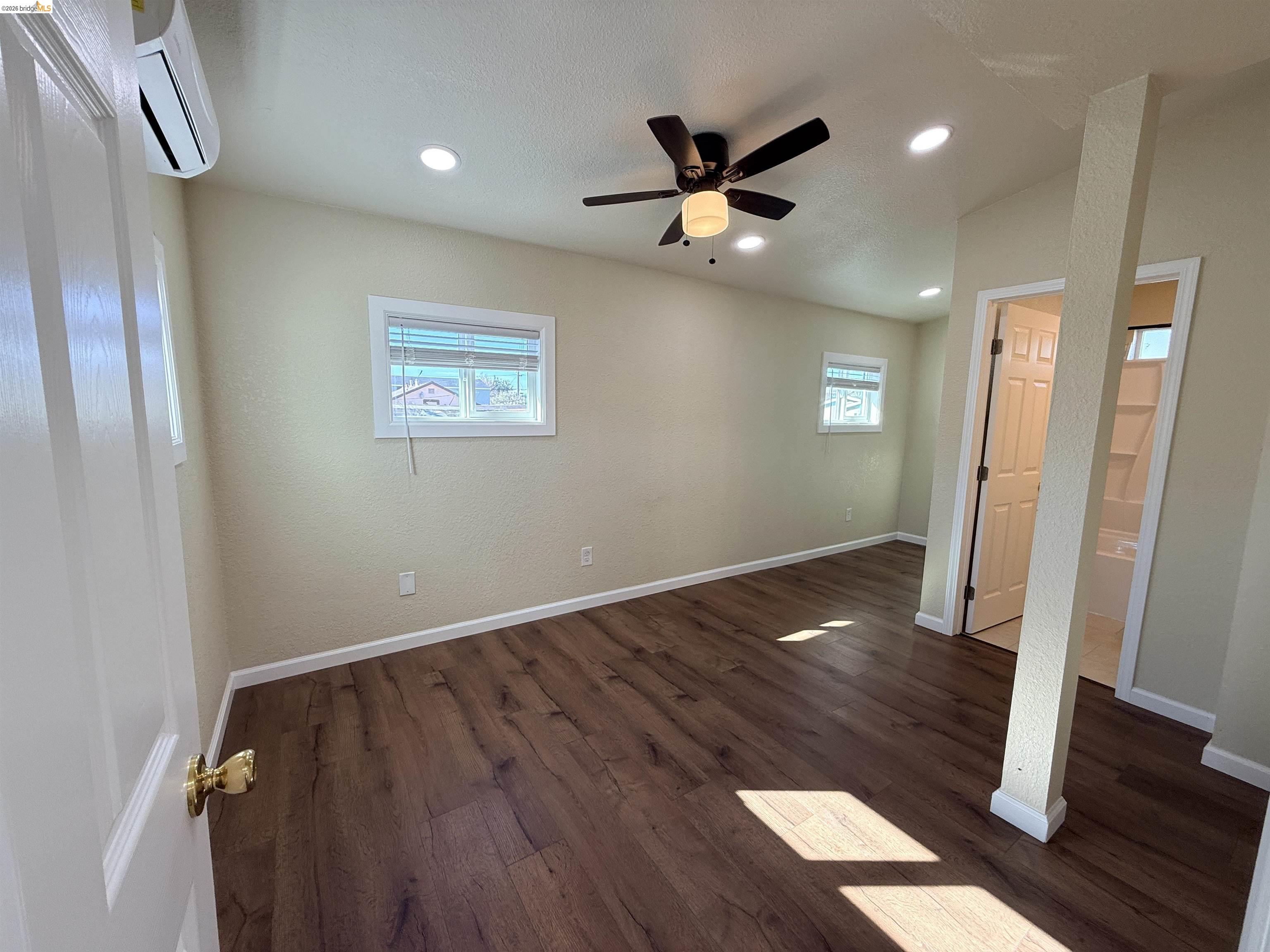 321 Benicia Road Vallejo, CA 94590 - Photo 10 of 48 Unfurnished bedroom with dark wood-style flooring, a ceiling fan, and recessed lighting