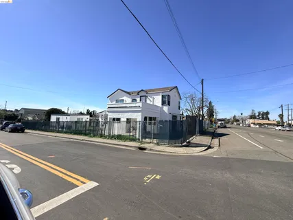 a backyard of a house with yard and garage