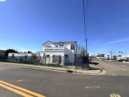 a view of a street with houses