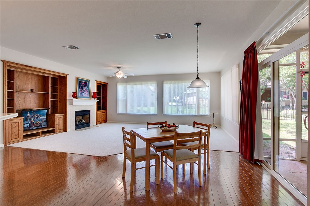 122 Nolan Drive Georgetown, TX 78633 - Photo 1 of 1 a view of a dining room with furniture window and wooden floor