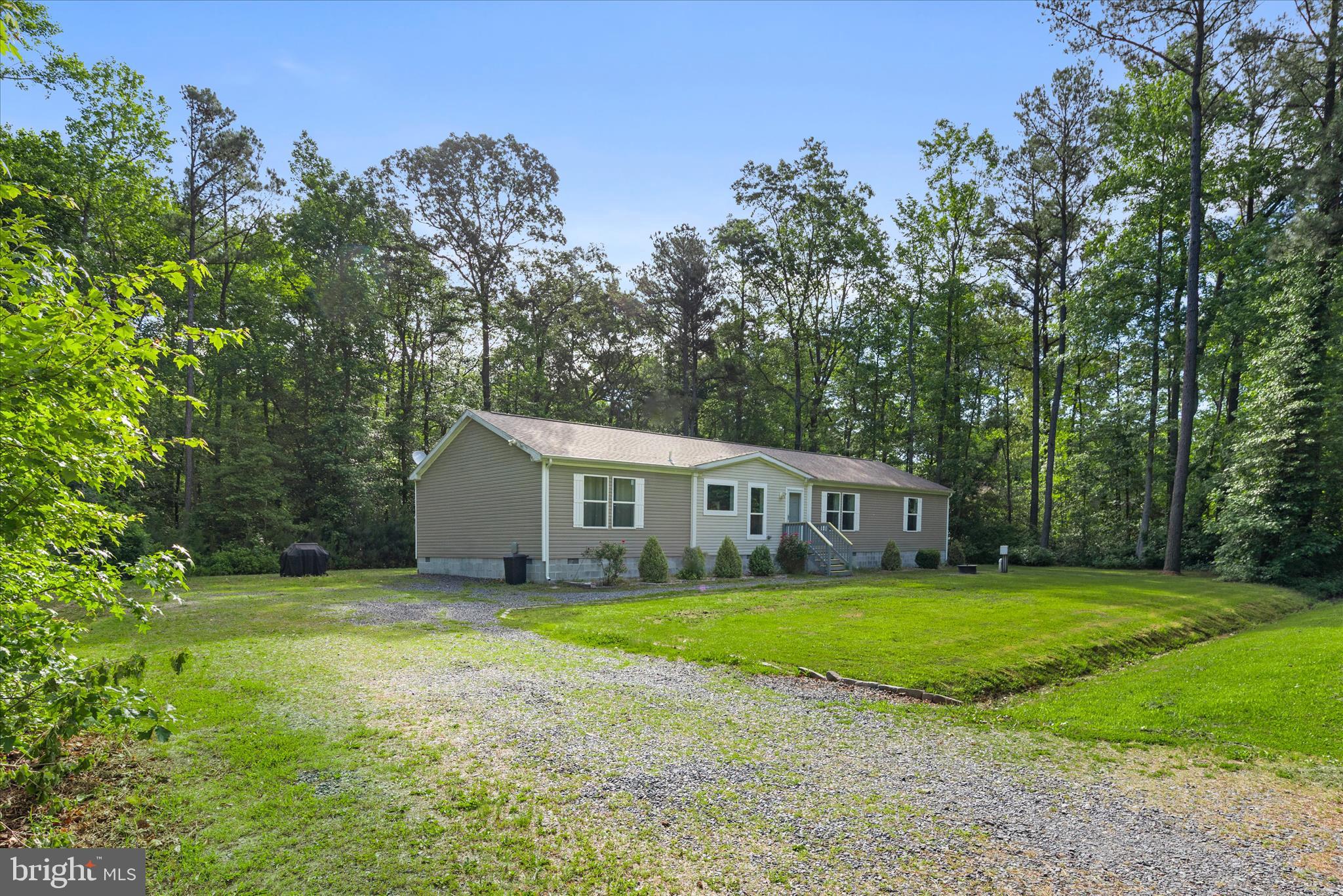 HOME SITS ON 1 ACRE AND LARGE GRAVEL DRIVEWAY