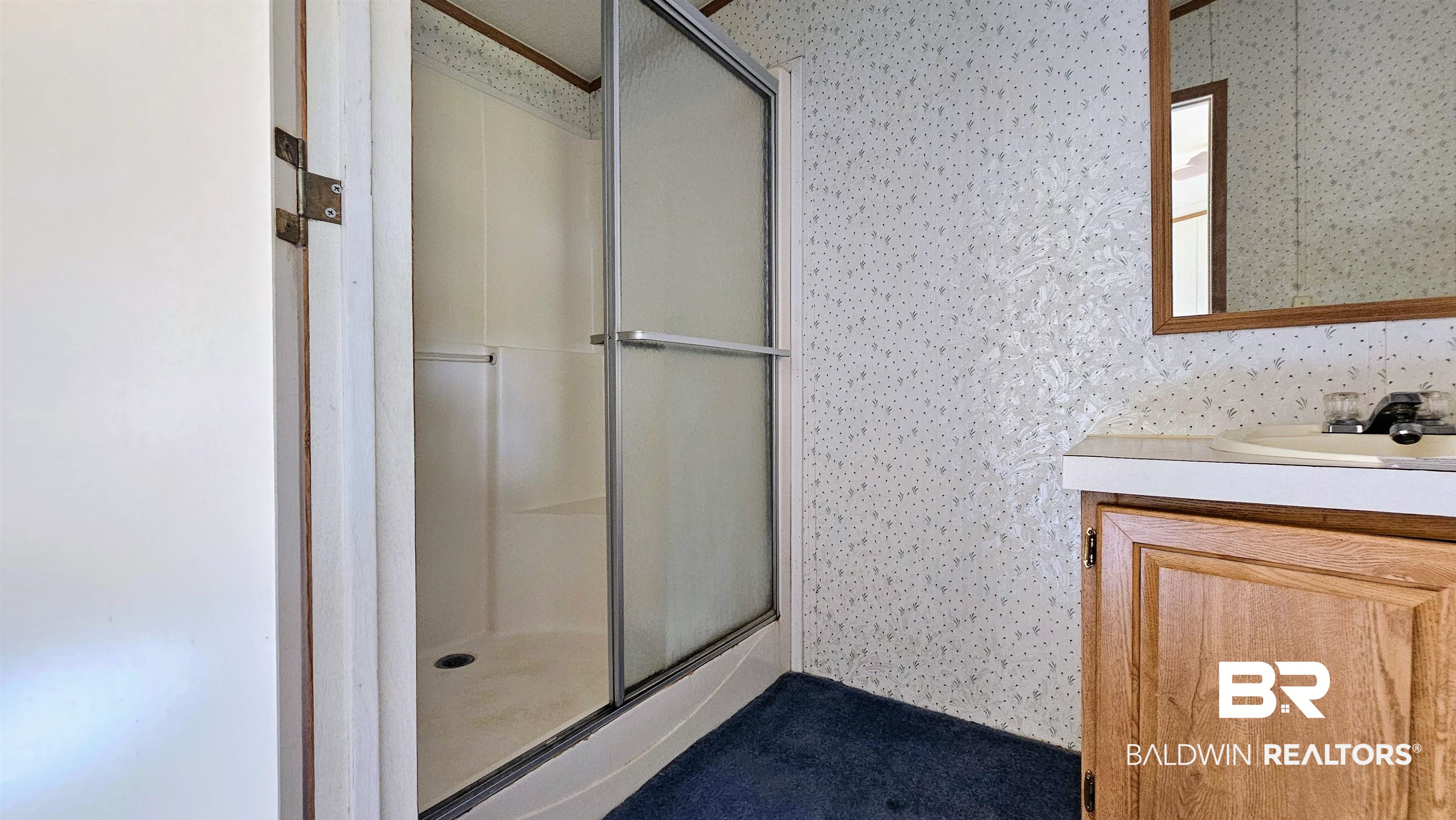 18659 Bull Springs Road Robertsdale, AL 36567 - Photo 11 of 25 Bathroom with a shower with door and vanity