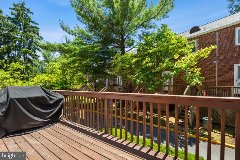 6701 Fairfax Road, Unit 76 Chevy Chase, MD 20815 - Photo 16 of 42 a view of balcony with wooden floor