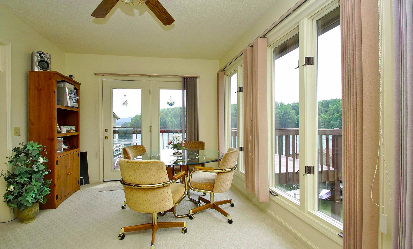 650 Monte Vista Road, Unit 403 Union Hall, VA 24176 - Photo 10 of 37 a living room with furniture and a floor to ceiling window