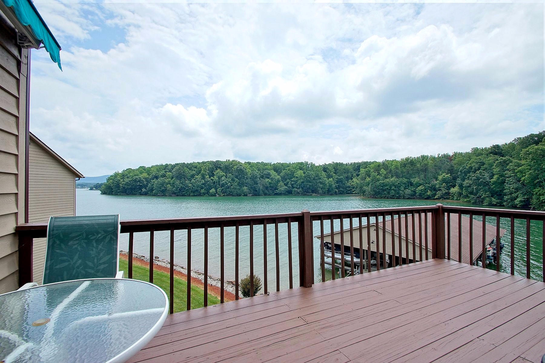 650 Monte Vista Road, Unit 403 Union Hall, VA 24176 - Photo 11 of 37 a balcony with wooden floor and fence