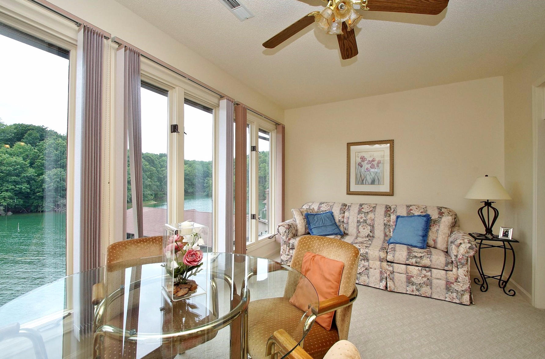 650 Monte Vista Road, Unit 403 Union Hall, VA 24176 - Photo 15 of 37 a living room with furniture and a floor to ceiling window