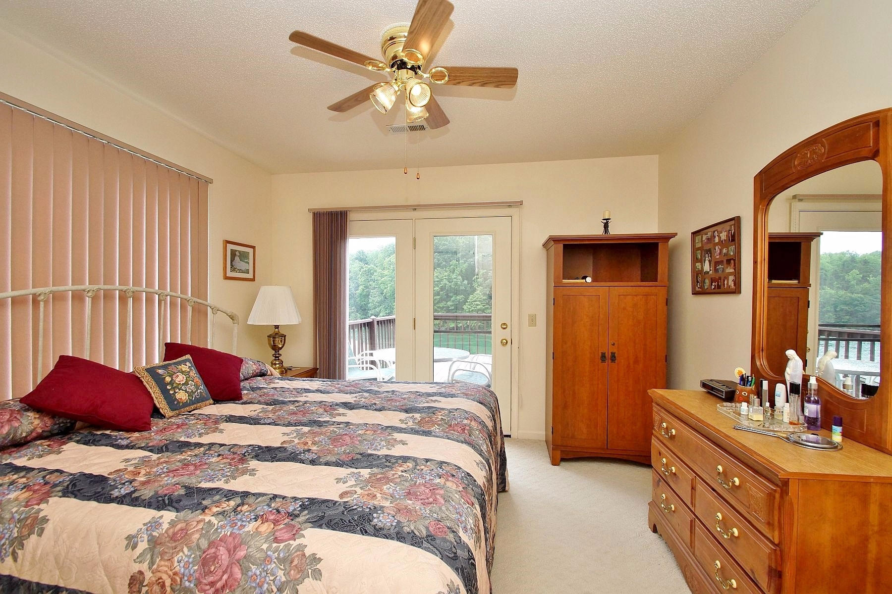 650 Monte Vista Road, Unit 403 Union Hall, VA 24176 - Photo 22 of 37 a bedroom with a bed and a chandelier