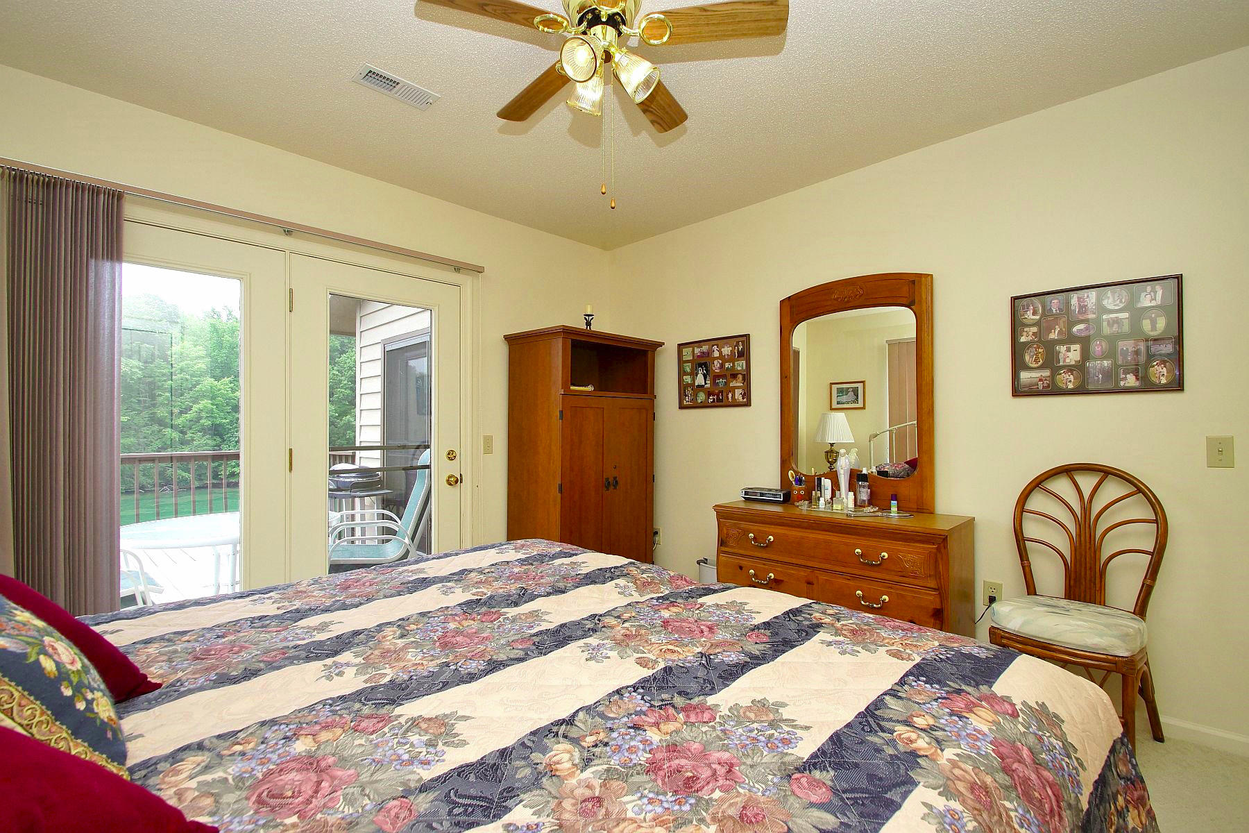 650 Monte Vista Road, Unit 403 Union Hall, VA 24176 - Photo 23 of 37 a bedroom with a bed and a dresser