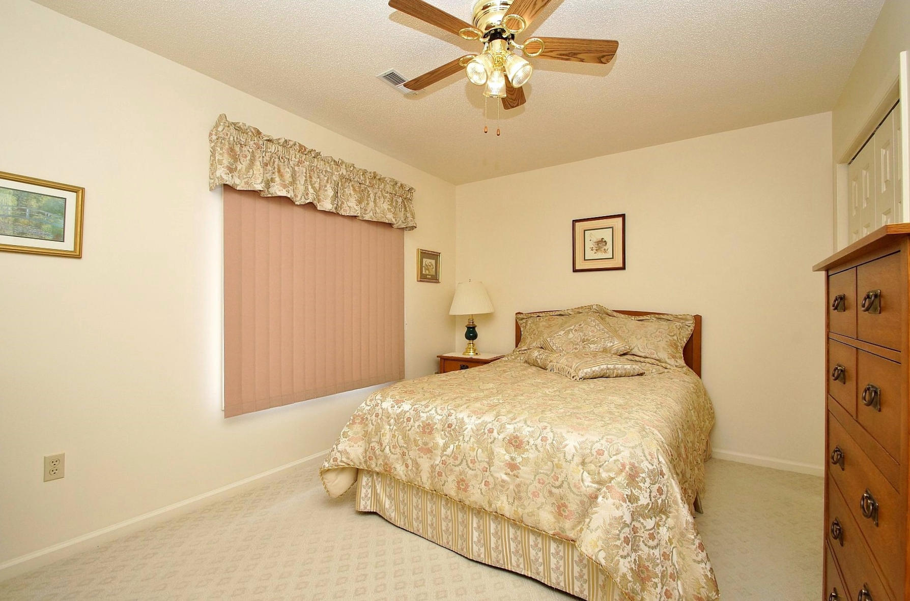 650 Monte Vista Road, Unit 403 Union Hall, VA 24176 - Photo 26 of 37 a bedroom with a bed and a chandelier