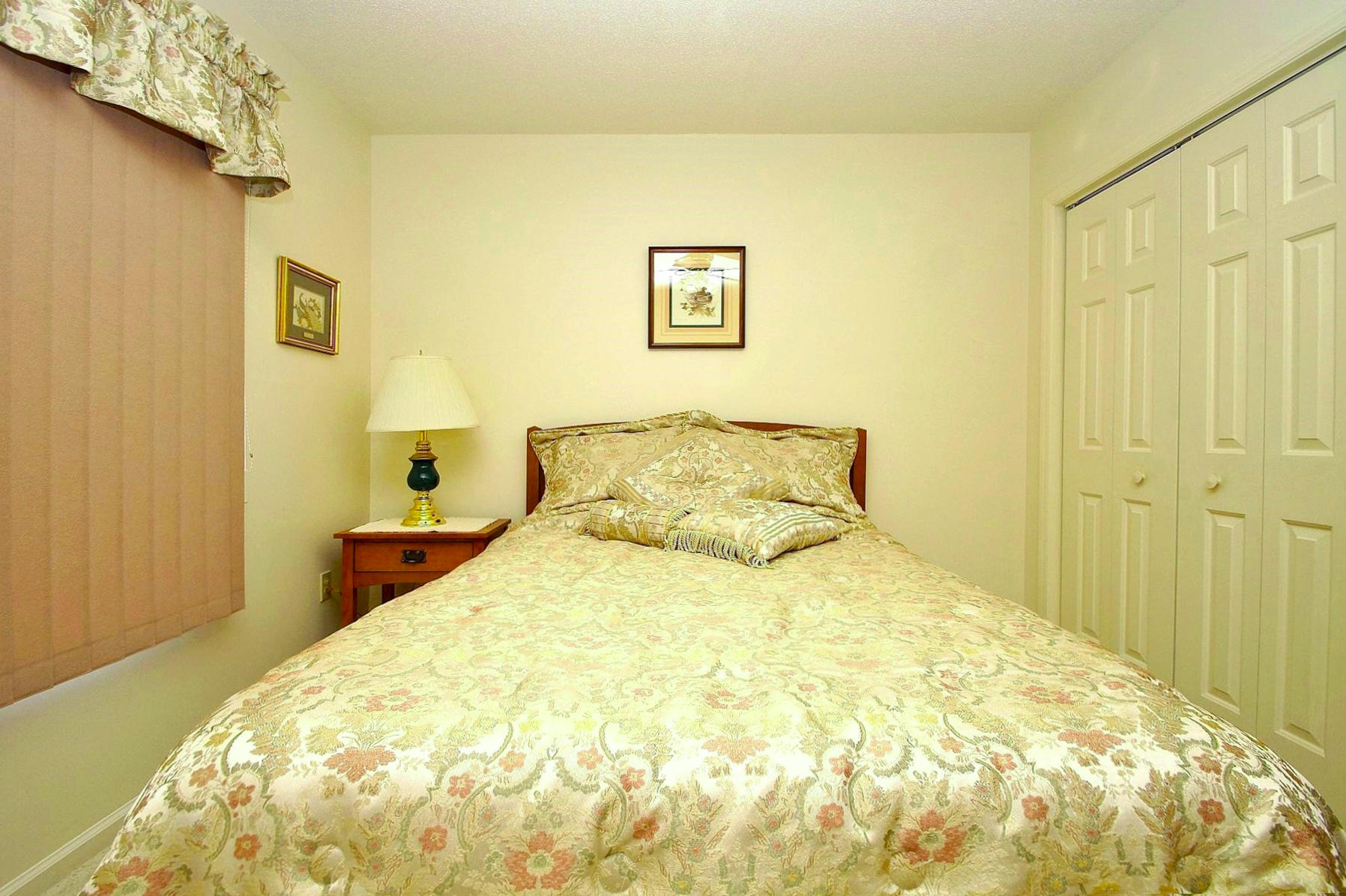 650 Monte Vista Road, Unit 403 Union Hall, VA 24176 - Photo 27 of 37 a large bed with a large mirror