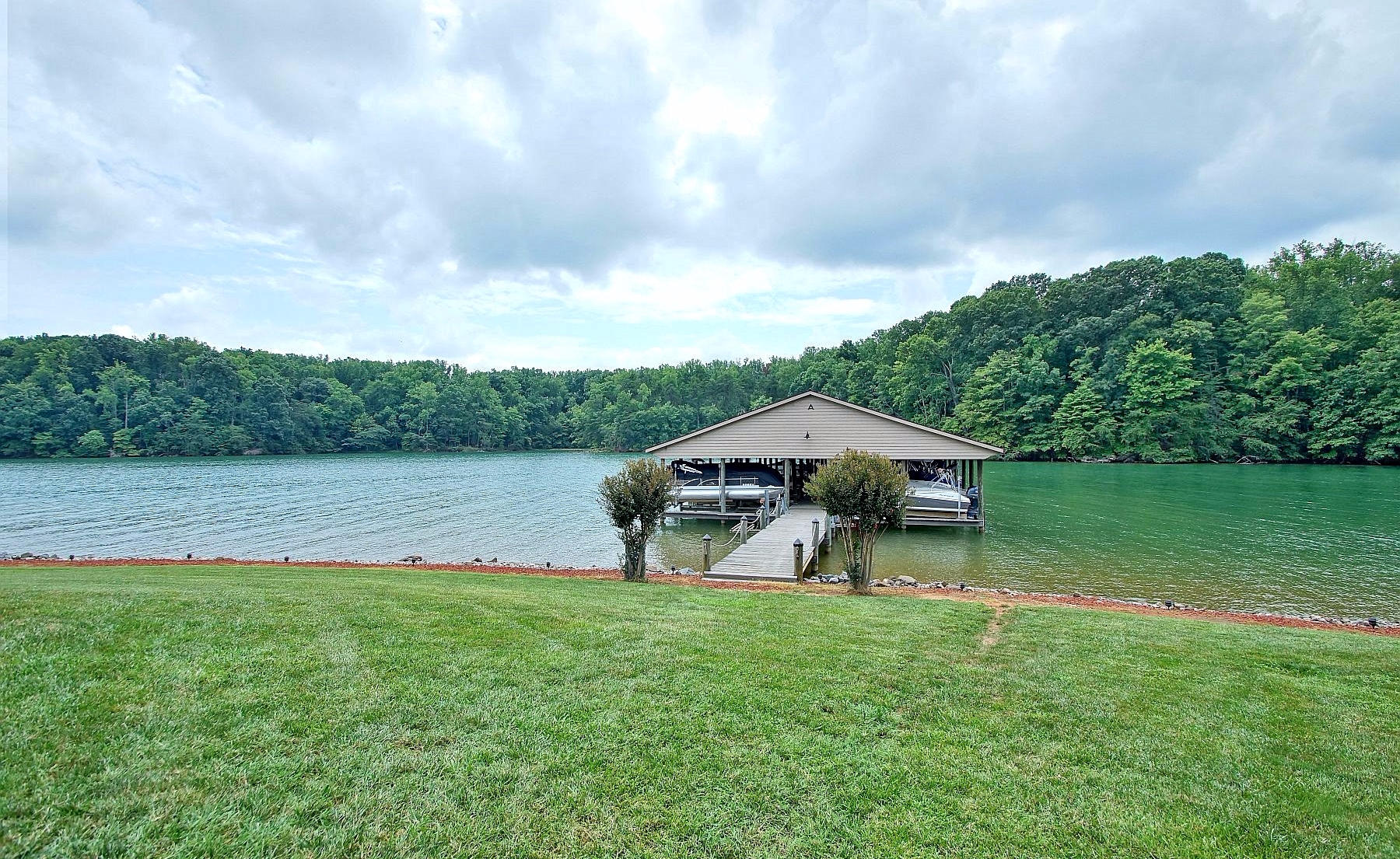 650 Monte Vista Road, Unit 403 Union Hall, VA 24176 - Photo 30 of 37 a view of a house with a yard and a fountain