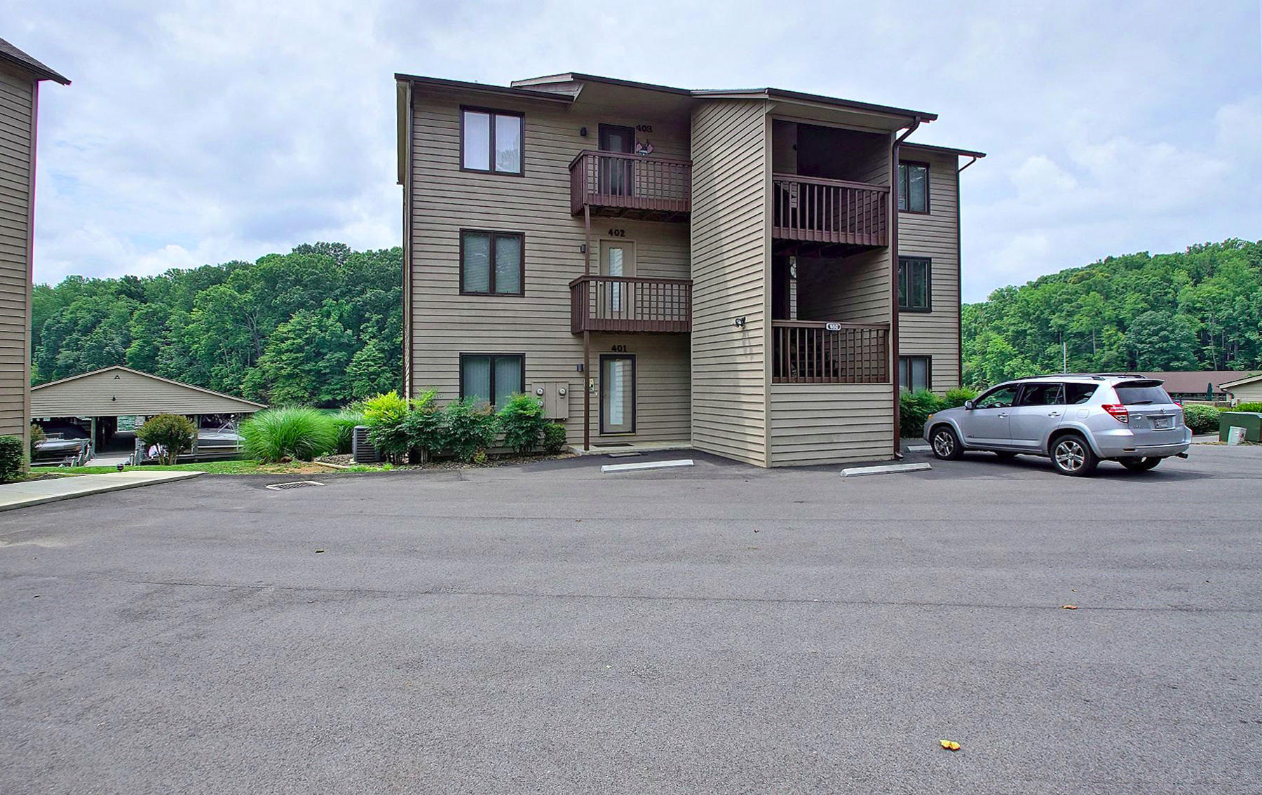 650 Monte Vista Road, Unit 403 Union Hall, VA 24176 - Photo 3 of 37 a car parked in front of a building