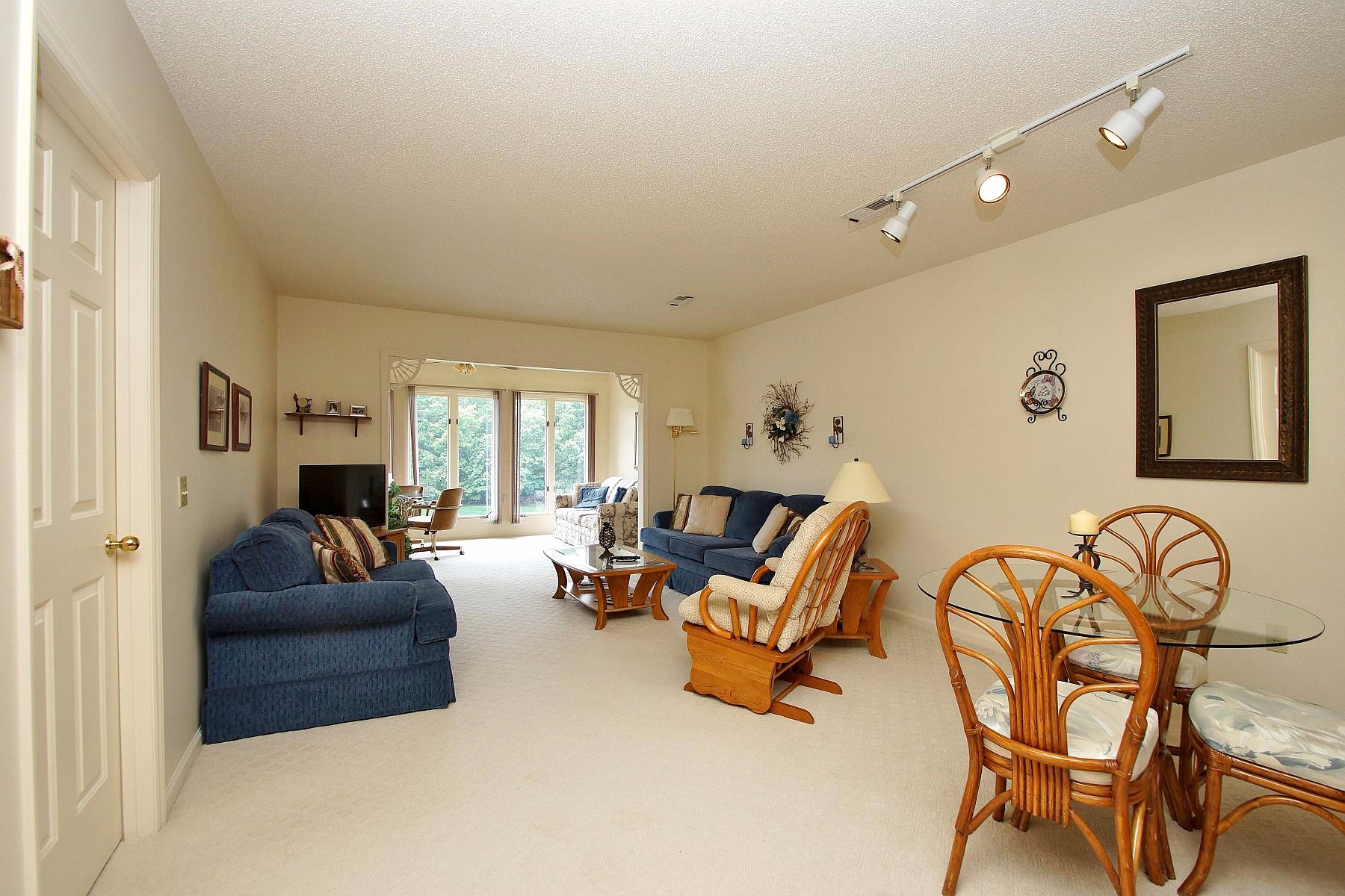 650 Monte Vista Road, Unit 403 Union Hall, VA 24176 - Photo 5 of 37 a living room with furniture and a large window