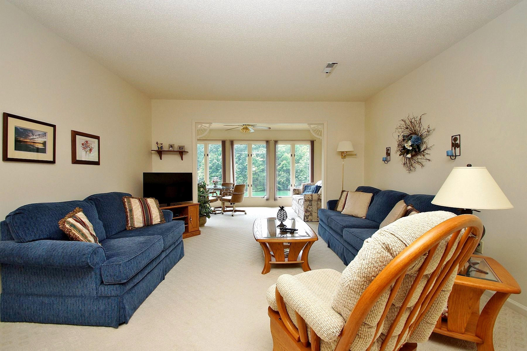 650 Monte Vista Road, Unit 403 Union Hall, VA 24176 - Photo 6 of 37 a living room with furniture and a large window