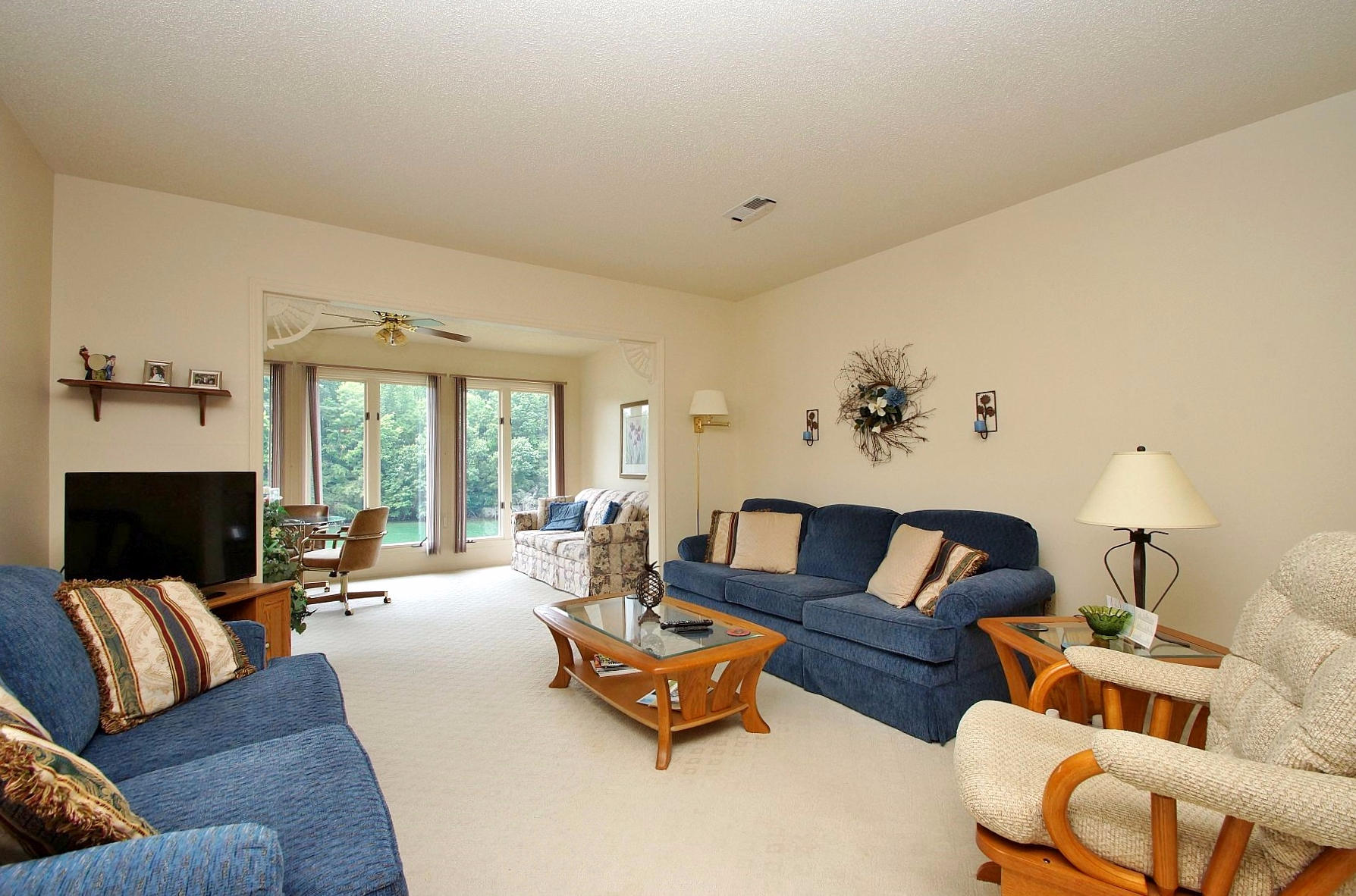650 Monte Vista Road, Unit 403 Union Hall, VA 24176 - Photo 7 of 37 a living room with furniture and a fireplace