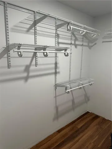 a view of a room with racks on the wall